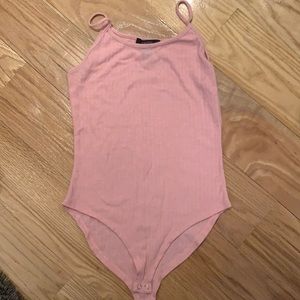 Light pink body suit